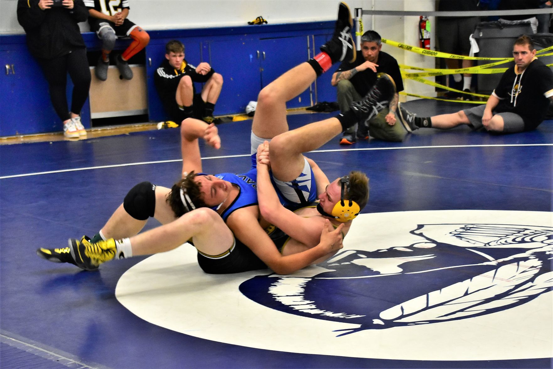 Lompoc's Armani Vinyard (Top) works hard to escape from Cabrillo's Patrick Durham